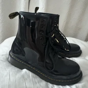 1460 Doc Marten Black Patent Leather Lace-Up Boots