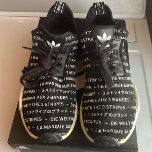 Adidas NMD R1 athletic shoes the brand with the 3 stripes running sneakers men 9