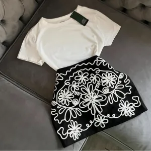 Black embroidered printed black &amp; white floral design mini skirt