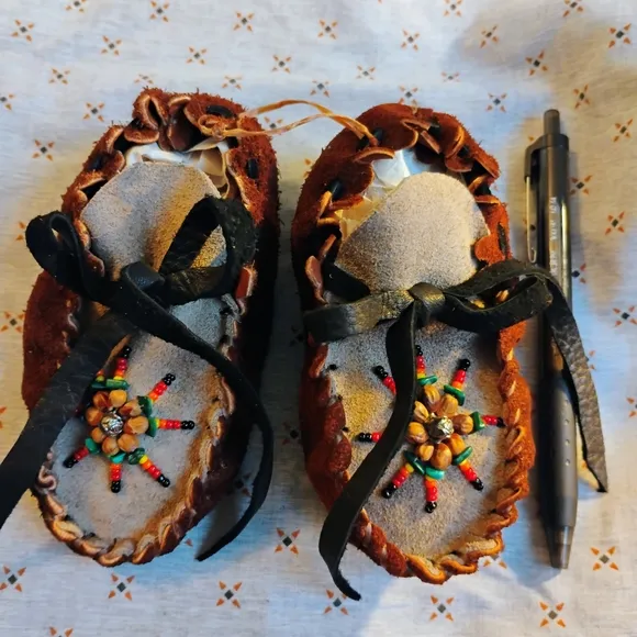 Brown and Black Moccasins with Intricate Beadwork
