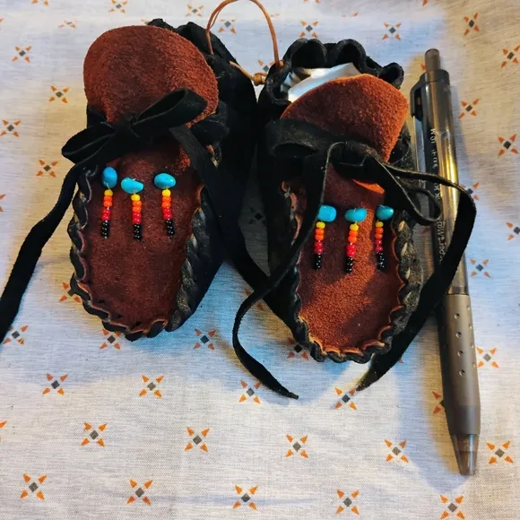 Brown and Black Moccasins with Intricate Beadwork