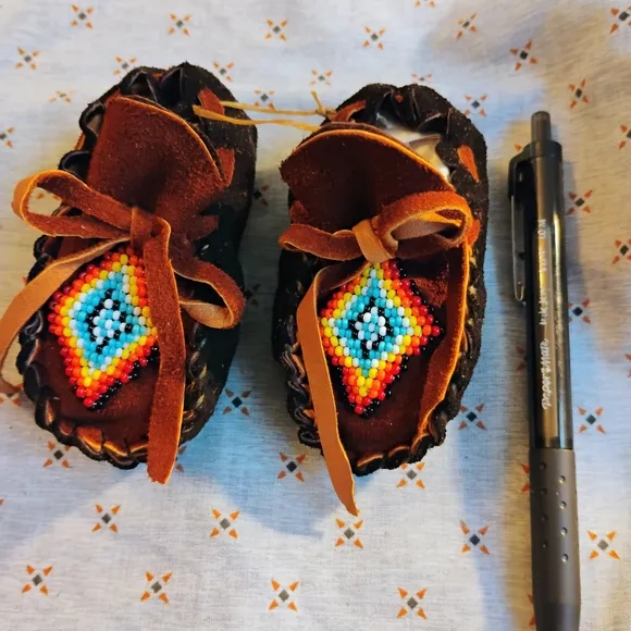 Brown and Black Moccasins with Intricate Beadwork