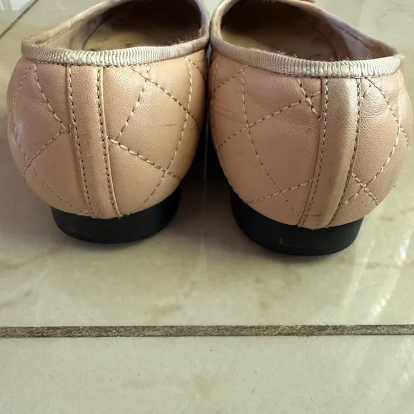CHANEL Cream and Black Flats Timeless Elegance