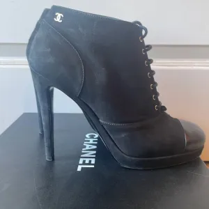 CHANEL Lace up booties