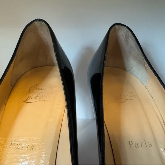 Classic black patent leather Louboutins