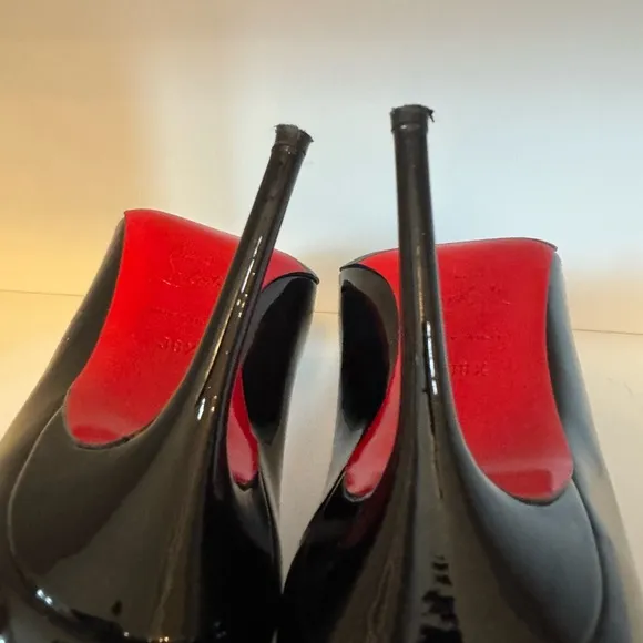 Classic black patent leather Louboutins