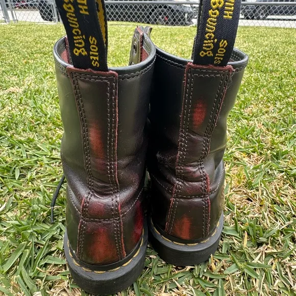 Dr. Martens Black and Red Combat Boots with Iconic Stitching