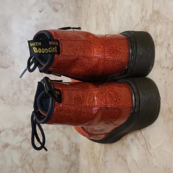 Dr. Martens red glitter zip and lace up combat youth boots size 3