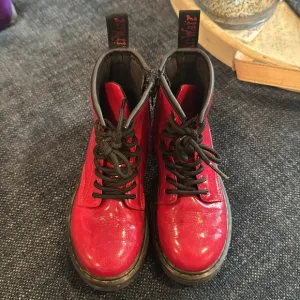 Dr. Martens Red Patent Leather Lace-Up Boots