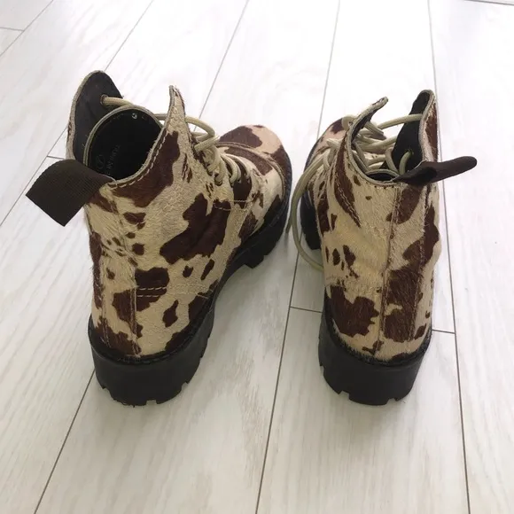 Faux cowhide platform combat boots