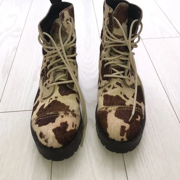 Faux cowhide platform combat boots