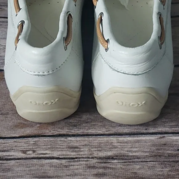 Geox Respira white Italian leather boat shoes with silver disc accent
