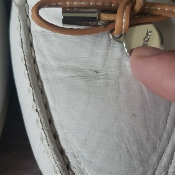 Geox Respira white Italian leather boat shoes with silver disc accent