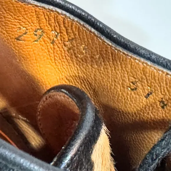 GUCCI Black and Tan Lace Up Boots with Striking Design