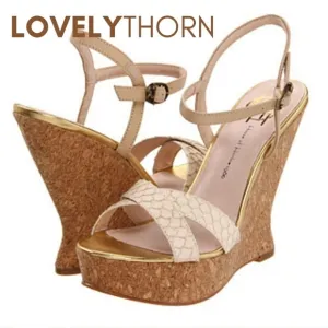 HOUSE OF HARLOW // ltd ed ivory leather python platform sculpted cork wedges