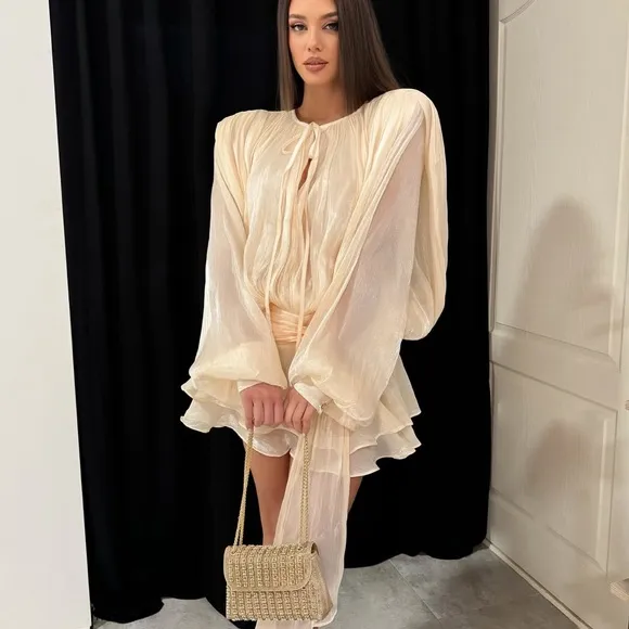 Ivory off white luxurious mini dress with puff sleeve ruffle hem flowy oversized