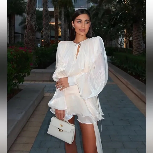 Ivory off white luxurious mini dress with puff sleeve ruffle hem flowy oversized