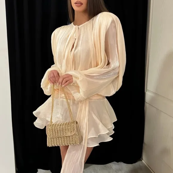 Ivory off white luxurious mini dress with puff sleeve ruffle hem flowy oversized