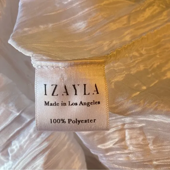 IZAYLA Shimmer White Crinkle Paperbag Peplum Waist Knee Length Skirt
