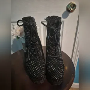 Jessica Simpson Black Lace Up Boots with Studded Details