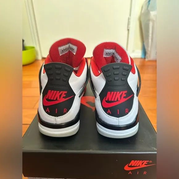 Nike Red and White Sneakers with Iconic Design