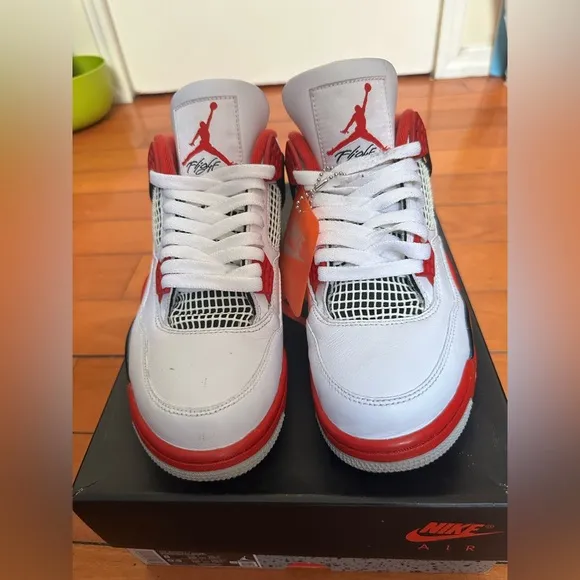 Nike Red and White Sneakers with Iconic Design