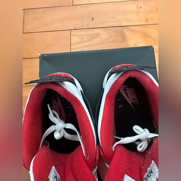 Nike Red and White Sneakers with Iconic Design