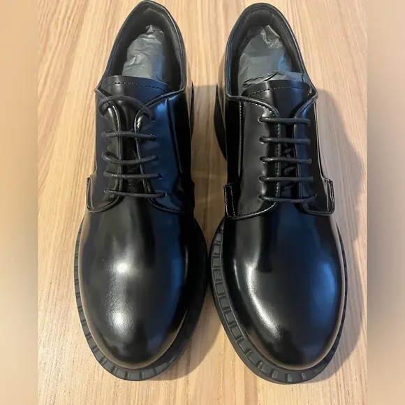 Prada Black leather lace up loafer. Woman’s size 7.