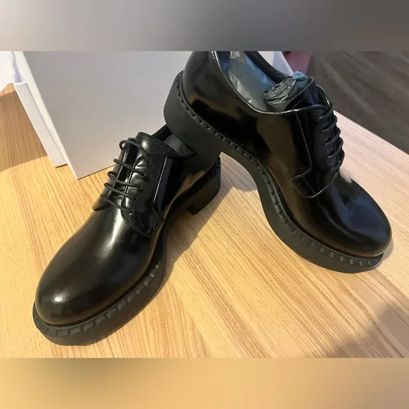 Prada Black leather lace up loafer. Woman’s size 7.