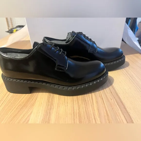 Prada Black leather lace up loafer. Woman’s size 7.