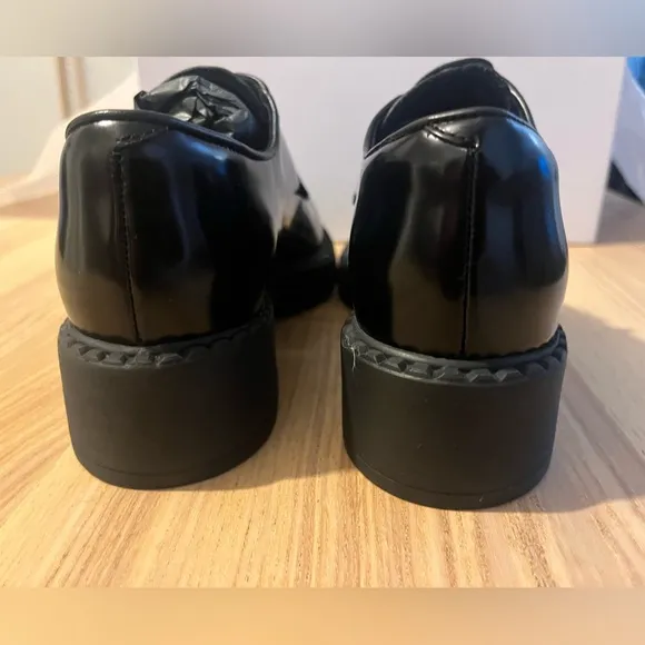 Prada Black leather lace up loafer. Woman’s size 7.