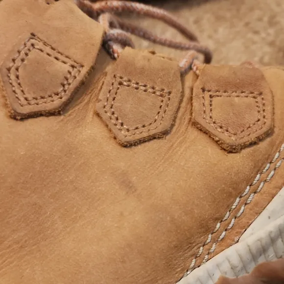 Sorel Out N Obout Tan and Black Lace-Up Boots