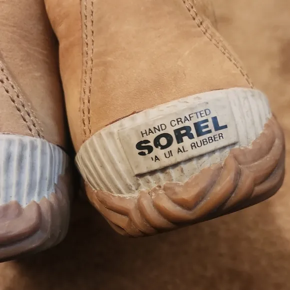 Sorel Out N Obout Tan and Black Lace-Up Boots
