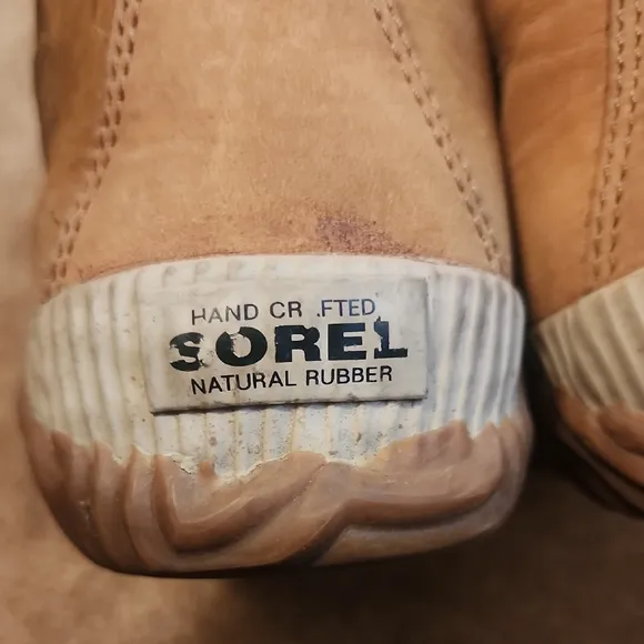 Sorel Out N Obout Tan and Black Lace-Up Boots