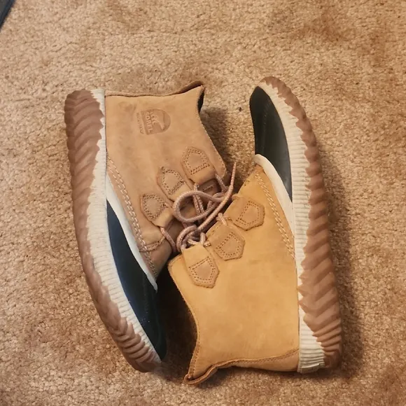 Sorel Out N Obout Tan and Black Lace-Up Boots