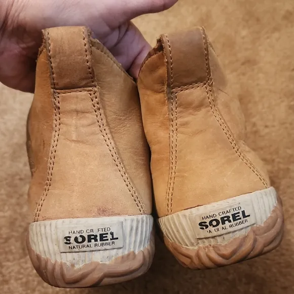 Sorel Out N Obout Tan and Black Lace-Up Boots