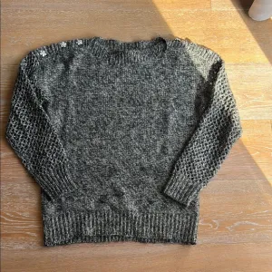 Trina Turk Sweater with rhinestone embellishments at shoulders