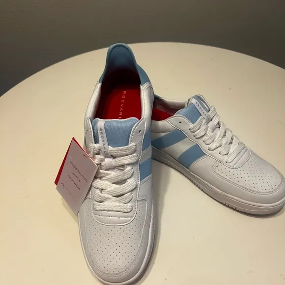 White and Blue Athletic Shoes with Classic Court Design