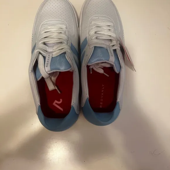 White and Blue Athletic Shoes with Classic Court Design