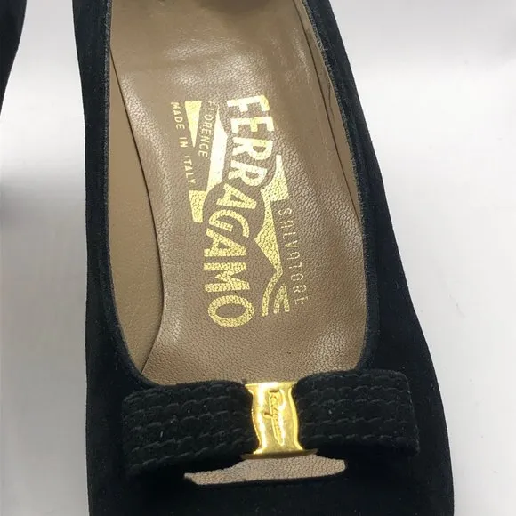 Women's black suede pumps with gold tone center to black bow Size 5.5 C
