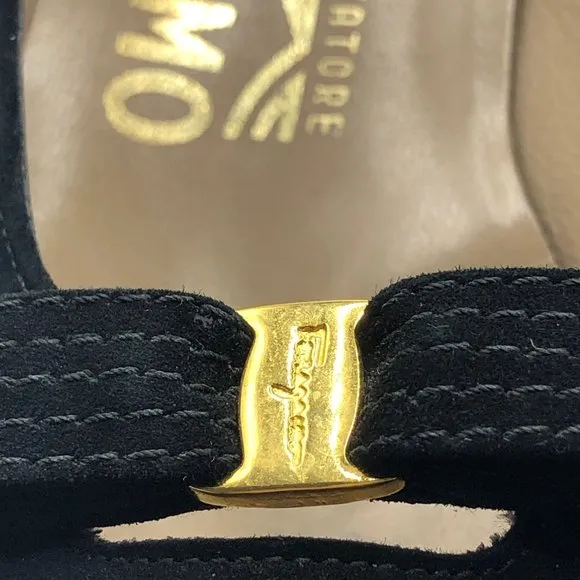 Women's black suede pumps with gold tone center to black bow Size 5.5 C