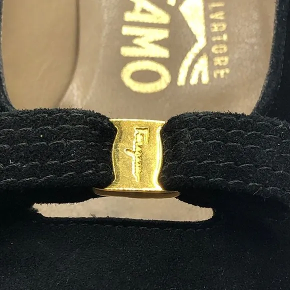 Women's black suede pumps with gold tone center to black bow Size 5.5 C